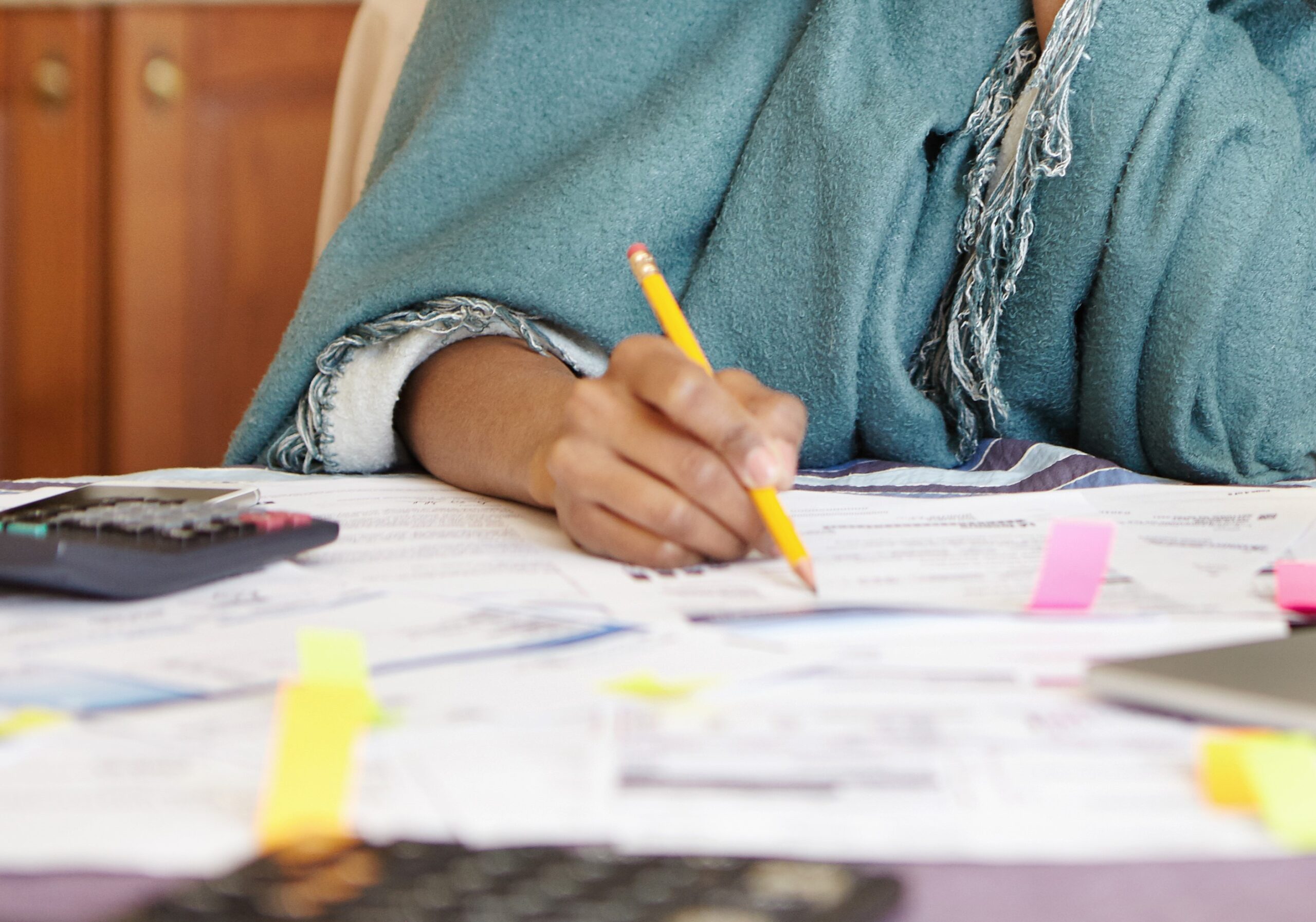 person preparing paper work