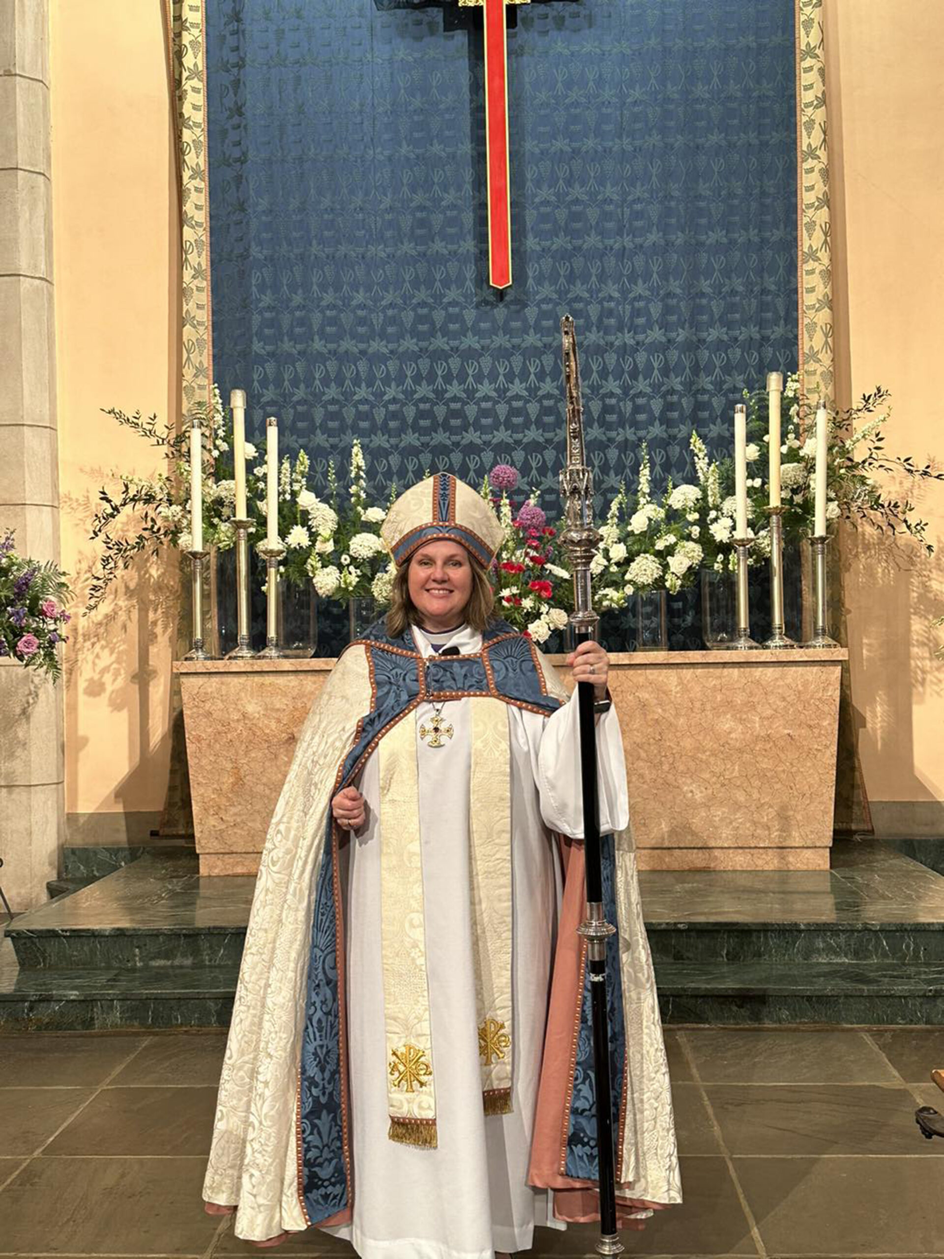 Bishop Sally French-at-Altar-scaled